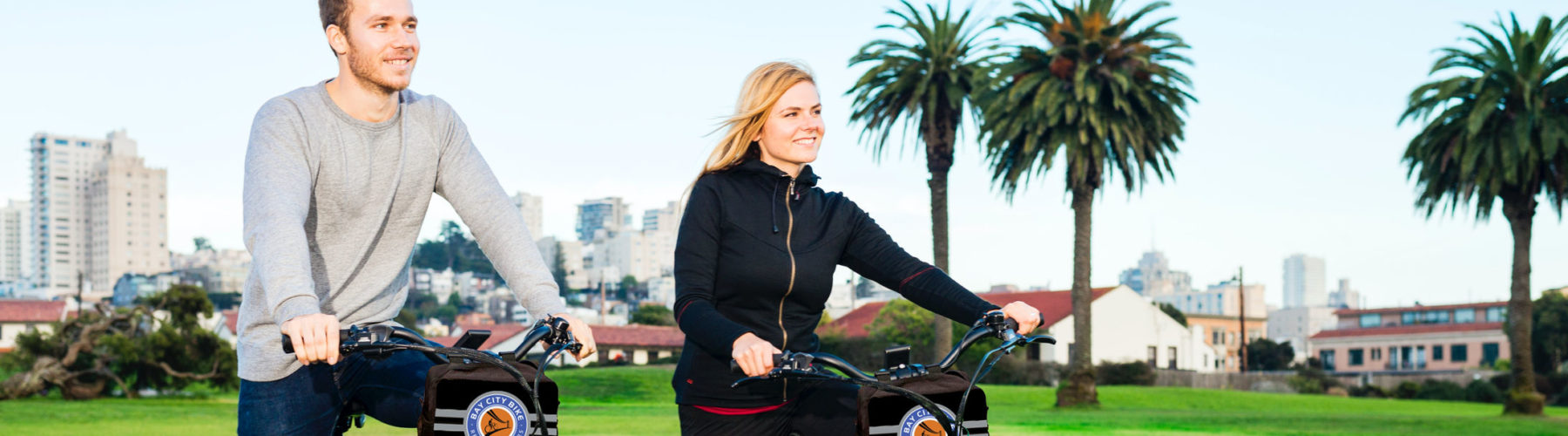 Riding E Bike with Bike Bag - San Francisco - Bay City Bike