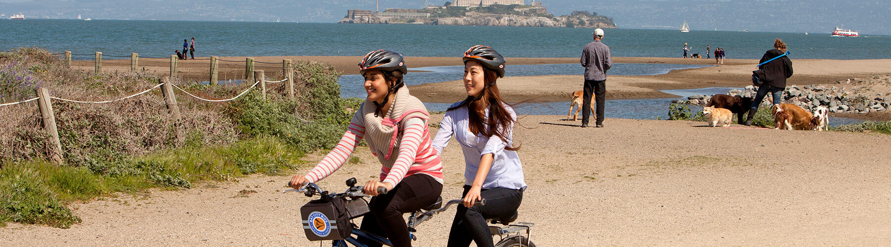 two girls riding tandem on the alcatraz tour san francisco activities