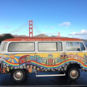 hippie bus in front of golden gate bridge