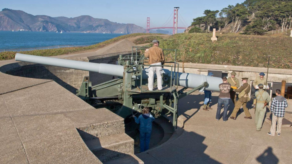 an old battery cannon over the san Francisco bay where you can view the golden gate bridge