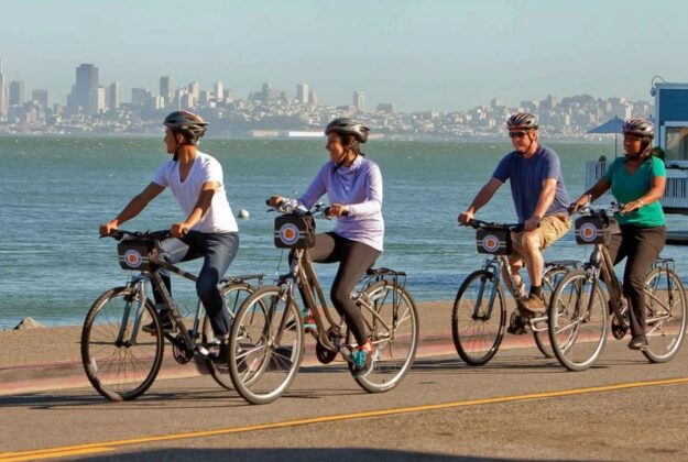 Four people riding bikes in San Francisco