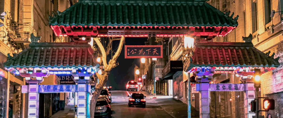 arch in san francisco's chinatown lit up at night