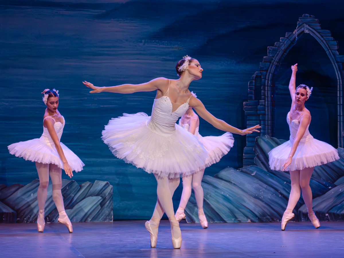 four ballet dancers performing